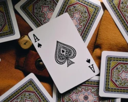 Photo credit: Jonathon Robles An Ace of Spades on top of scattered playing cards.