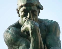 Photo credit: Charl Durand A statue of a man deep in thought.
